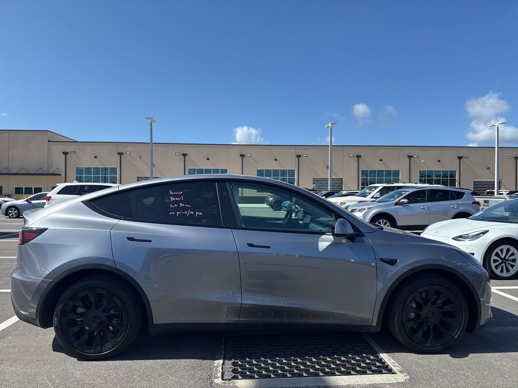 Used 2025 Tesla Model Y Long Range with VIN 7SAYGDEE0SF297627 for sale in St. Augustine, FL