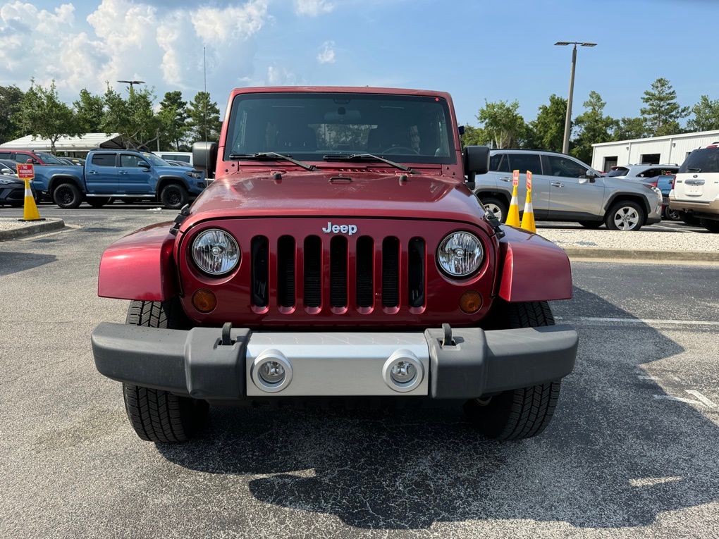 Used 2012 Jeep Wrangler Unlimited Sahara with VIN 1C4HJWEG1CL107053 for sale in Saint Augustine, FL