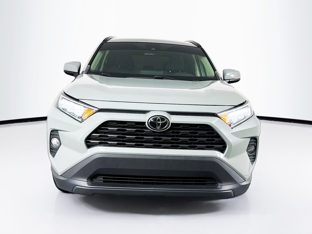 Used 2021 Toyota RAV4 XLE with VIN JTMP1RFV1MD532083 for sale in Kansas City