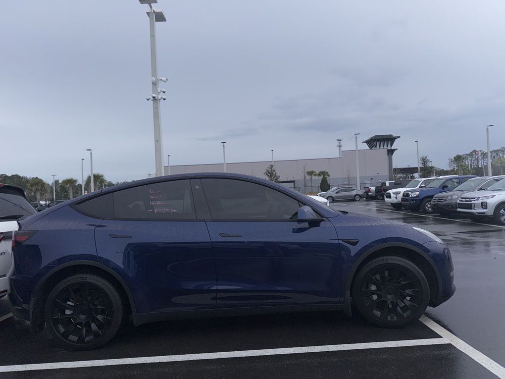 Used 2023 Tesla Model Y Long Range with VIN 7SAYGDEE9PA113290 for sale in Kansas City