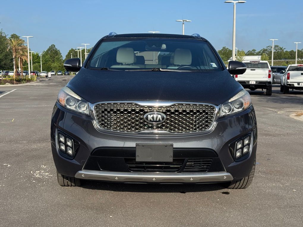 Used 2017 Kia Sorento SXL with VIN 5XYPK4A53HG297152 for sale in Saint Augustine, FL