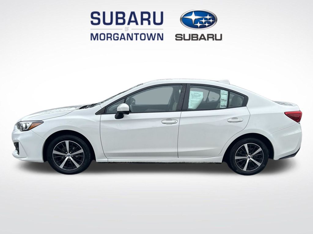 Crystal White Pearl 2019 Subaru Impreza 2.0i Premium Sedan AWD Sedan All-Wheel Drive Continuously Variable Transmission