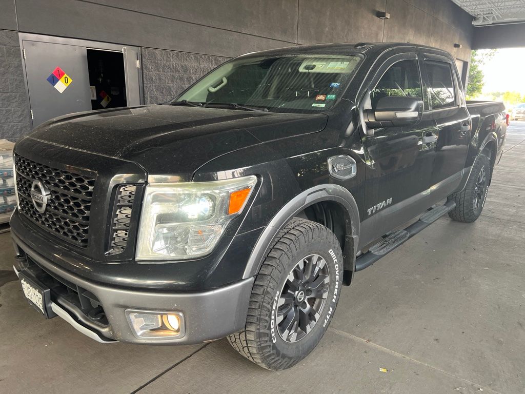Gray (Magnetic Black) 2017 Nissan Titan Pickup Truck Four-Wheel Drive 7-Speed Automatic