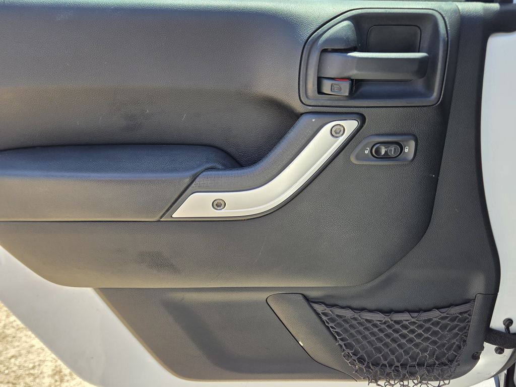 2015 Jeep Wrangler Unlimited Sahara White at DeMontrond Automotive Group