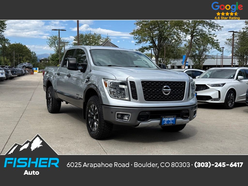 Brilliant Silver 2017 Nissan Titan Pickup Truck Four-Wheel Drive 7-Speed Automatic