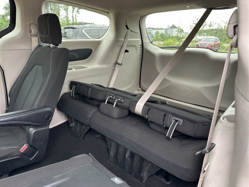 2023 Brilliant Black Crystal Pearlcoat Chrysler Voyager LX FWD Van