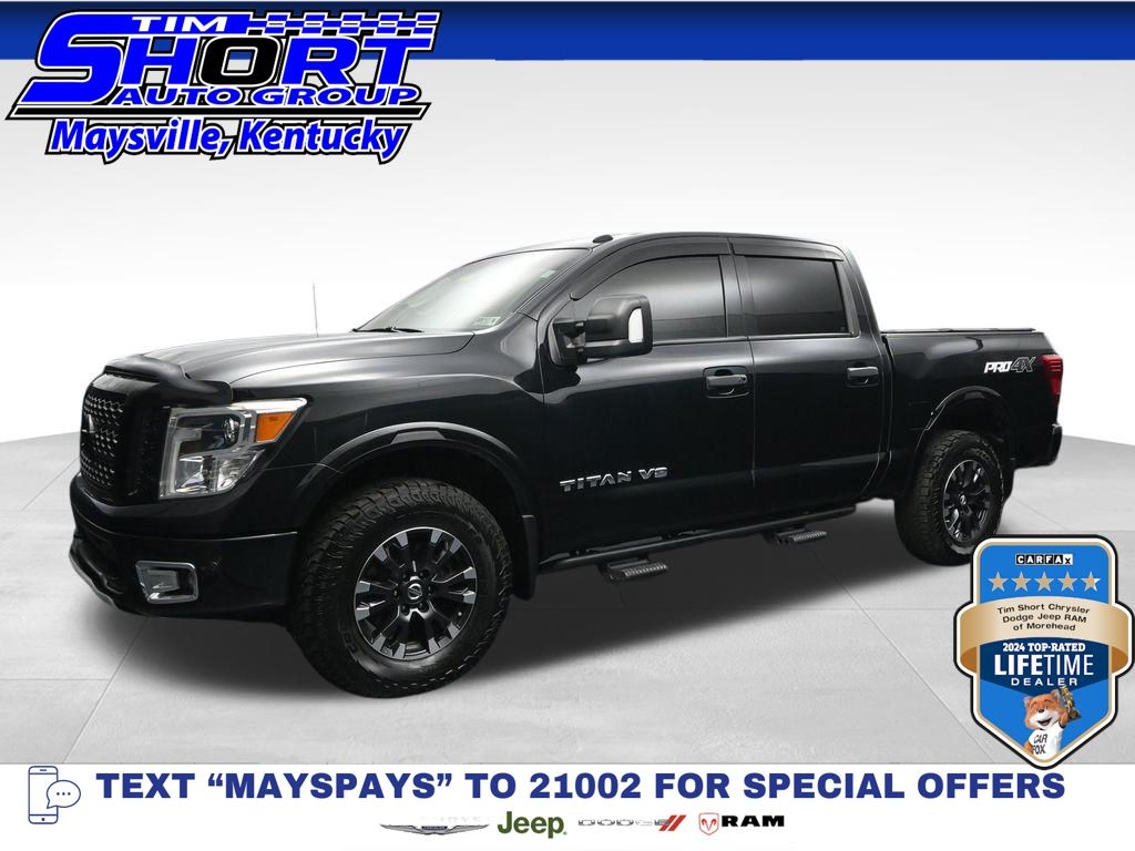 Gray (Magnetic Black Metallic) 2019 Nissan Titan Pickup Truck Four-Wheel Drive 7-Speed Automatic