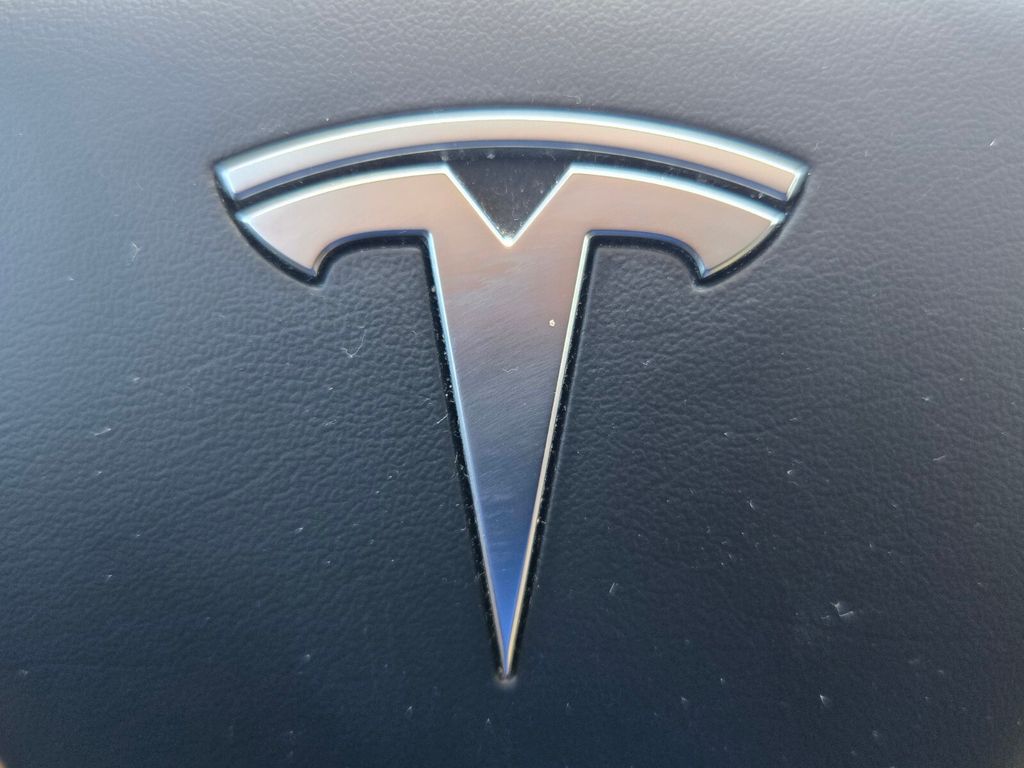 2023 Tesla Model Y - $28,625