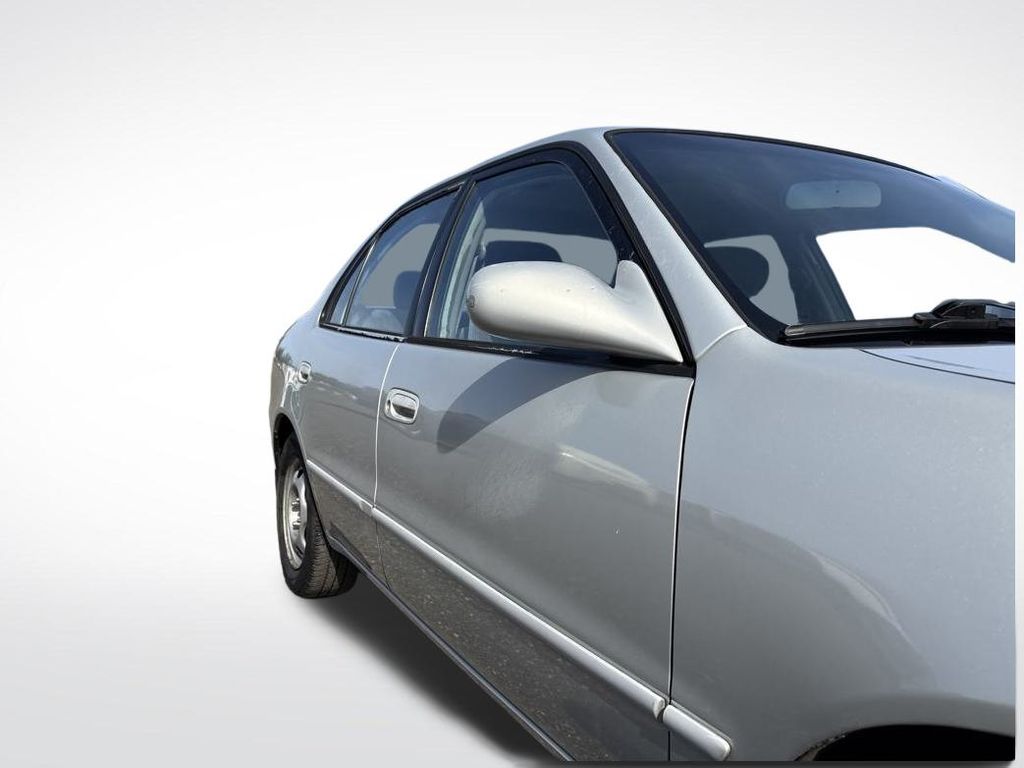 2000 Silver Stream Opal Toyota Corolla LE FWD Sedan