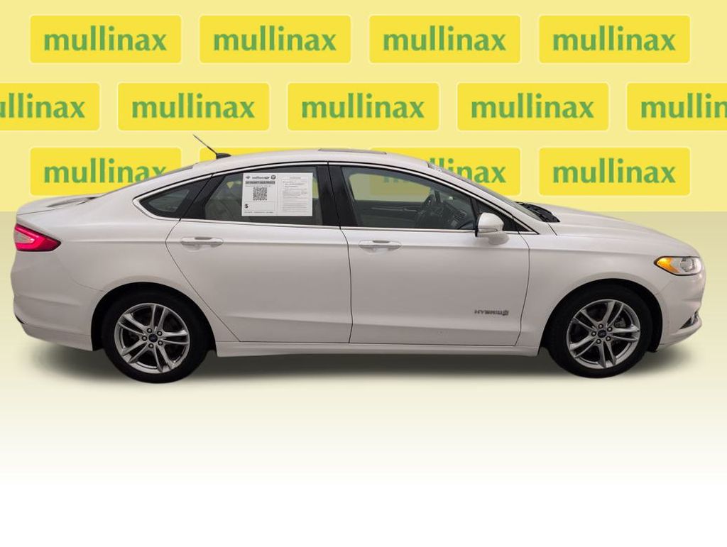 Used 2015 Ford Fusion Hybrid Titanium with VIN 3FA6P0RU3FR157578 for sale in Kissimmee, FL