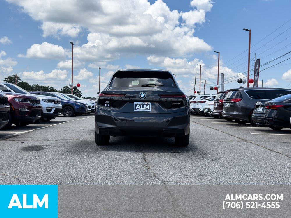 Used 2024 Black BMW xDrive50 image 6