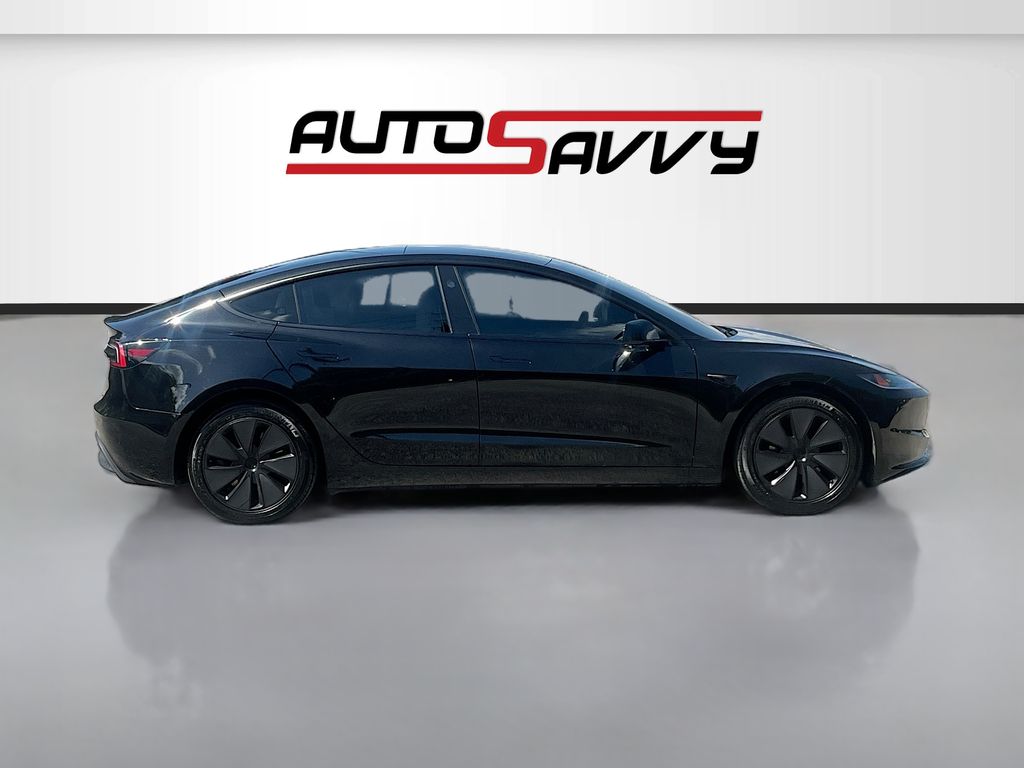 2025 Tesla Model 3 Long Range Black at AutoSavvy Houston Northwest