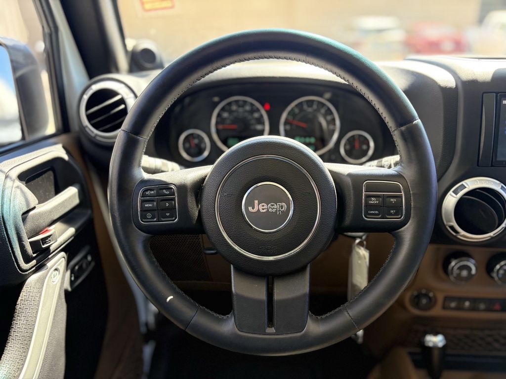 2014 Jeep Wrangler Unlimited Sahara White at Autostrade