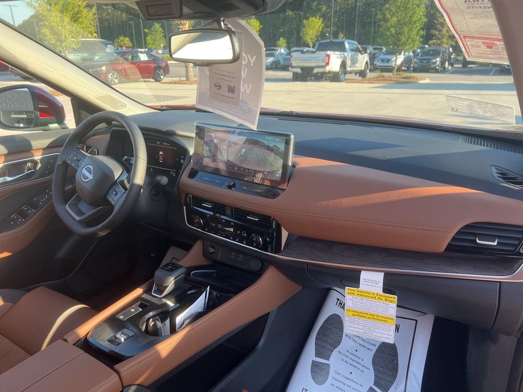 2025 Scarlet Ember Tintcoat Nissan Rogue Platinum FWD SUV