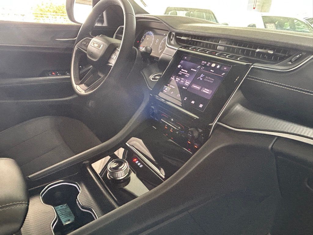 Used 2025 Bright White Clearcoat Jeep Laredo image 32