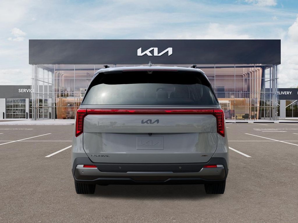 2027 Kia Carnival Hybrid SX PRESTIGE AUTO White at Shottenkirk Kia Fort Bend