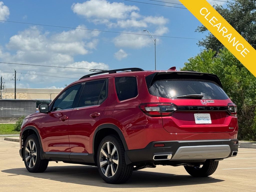 2025 Honda Pilot Touring Red at Community Honda