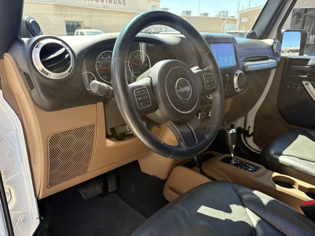 2014 Jeep Wrangler Unlimited Sahara White at Autostrade
