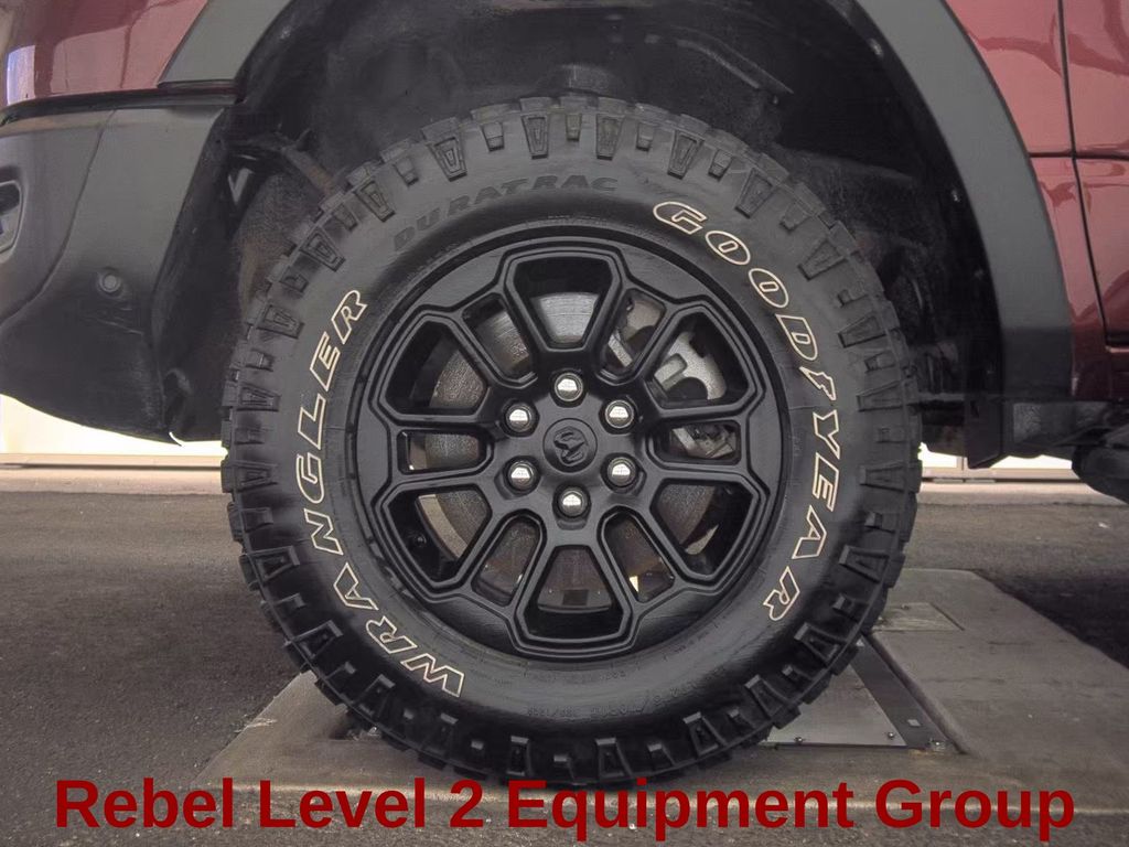 2025 Delmonico Red Pearlcoat Ram 1500 Rebel 4X4 Truck