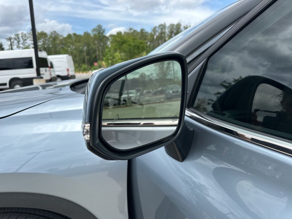 2023 Celestial Silver Metallic Toyota Highlander LE FWD SUV