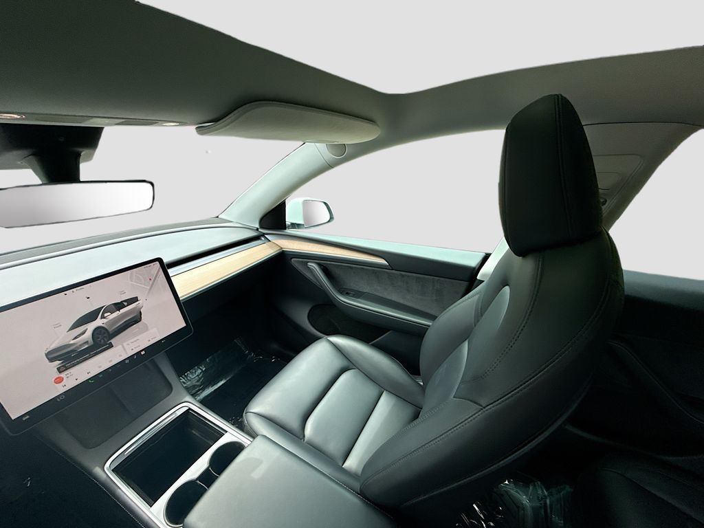 2024 Tesla Model Y Long Range White at AutoSavvy Houston Southwest