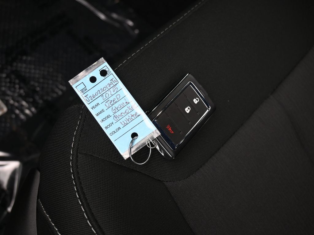 Used 2025 Bright White Clearcoat Jeep Laredo image 17