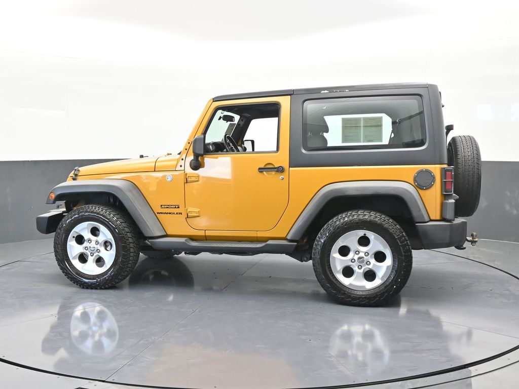 Used 2014 Jeep Wrangler Sport with VIN 1C4AJWAG4EL188012 for sale in Miami, FL