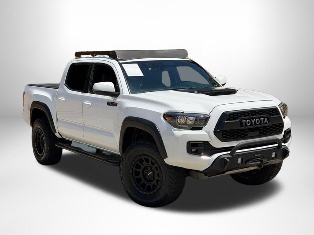 Super White 2019 Toyota Tacoma Pickup Truck Four-Wheel Drive 6-Speed Automatic