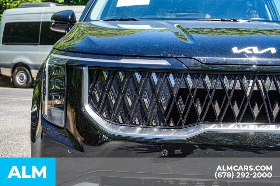 Used 2025 Black Kia LXS image 12
