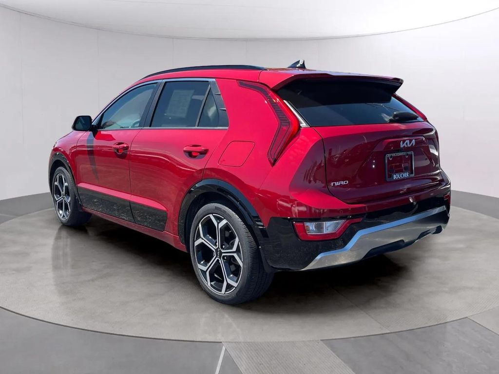 Certified Used 2025 Runway Red Kia EX Touring image 3