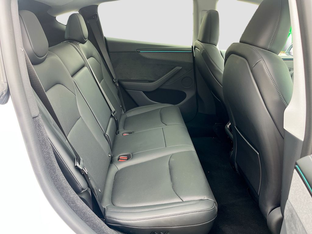 2026 Tesla Model Y Long Range White at AutoSavvy Houston Northwest