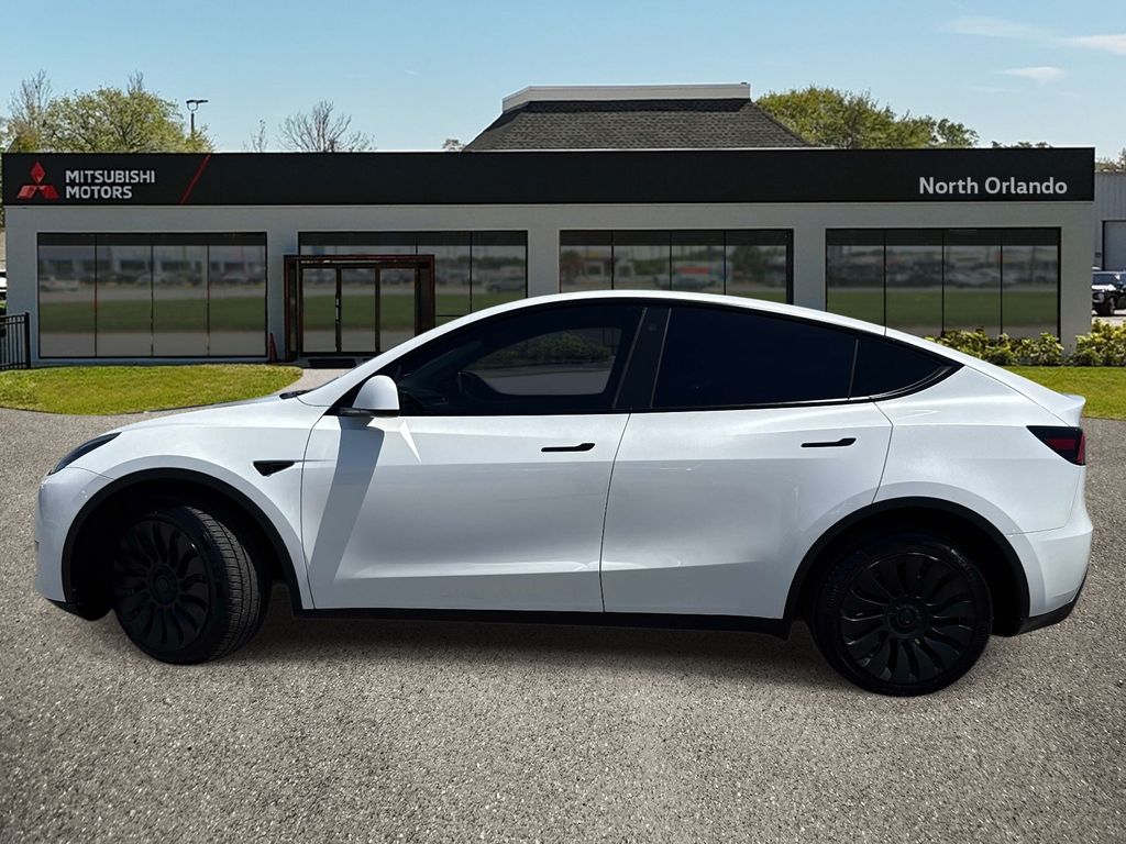 Used 2023 Tesla Model Y Long Range with VIN 7SAYGDEE1PA122789 for sale in Orlando, FL