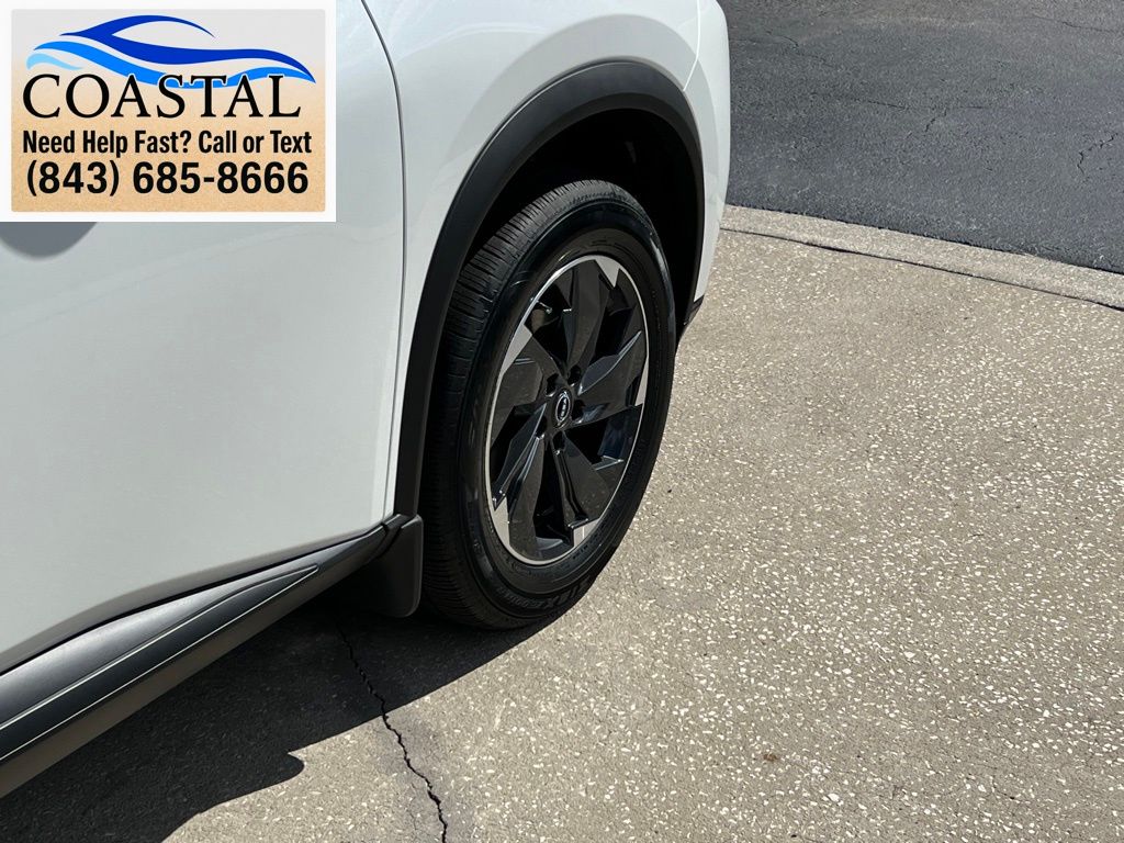 2026 Nissan Rogue SV White at Coastal Chevrolet Cadillac