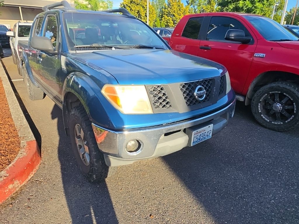 Electric Blue Metallic 2005 Nissan Frontier Pickup Truck Four-Wheel Drive 5-Speed Automatic Overdrive