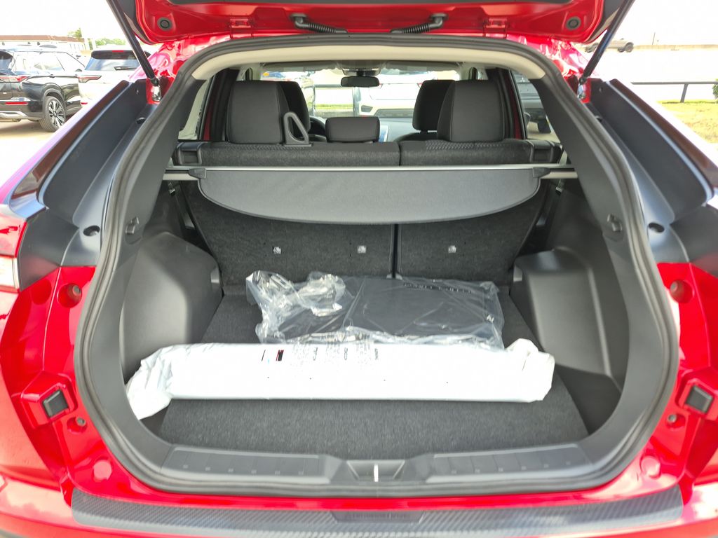 2025 Mitsubishi Eclipse Cross LE Red at DeMontrond Gulf Freeway