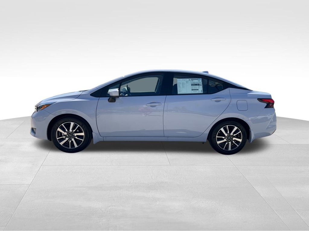 2025 Gray Sky Pearl Nissan Versa 1.6 SV FWD Sedan