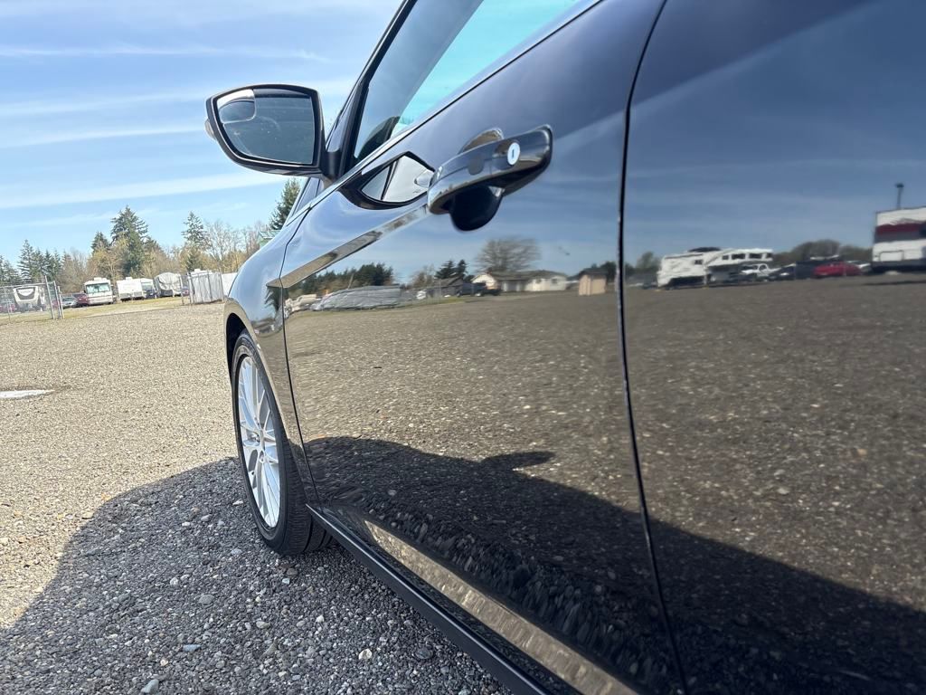 2014 Tuxedo Black Metallic Ford Focus Titanium FWD Hatchback