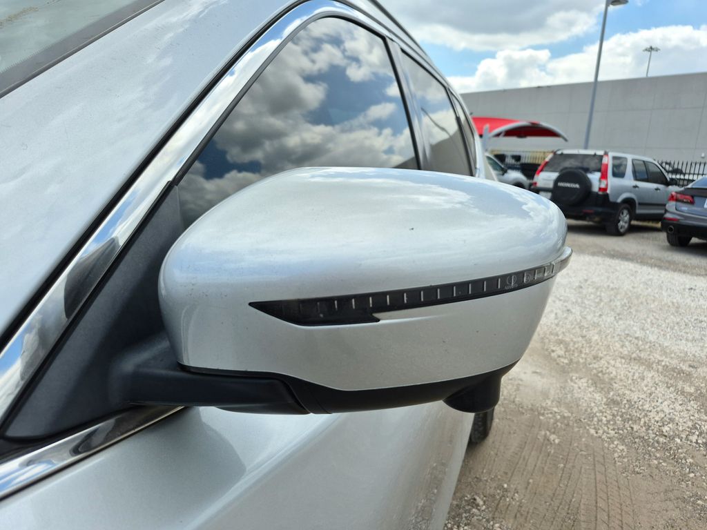 2016 Nissan Rogue SL Silver at DeMontrond Gulf Freeway