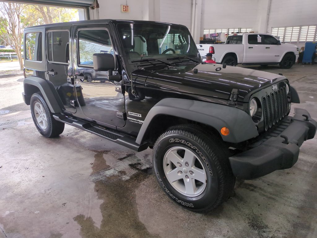 Used 2018 Jeep Wrangler JK Unlimited Sport S with VIN 1C4HJWDG1JL928619 for sale in Tamarac, FL
