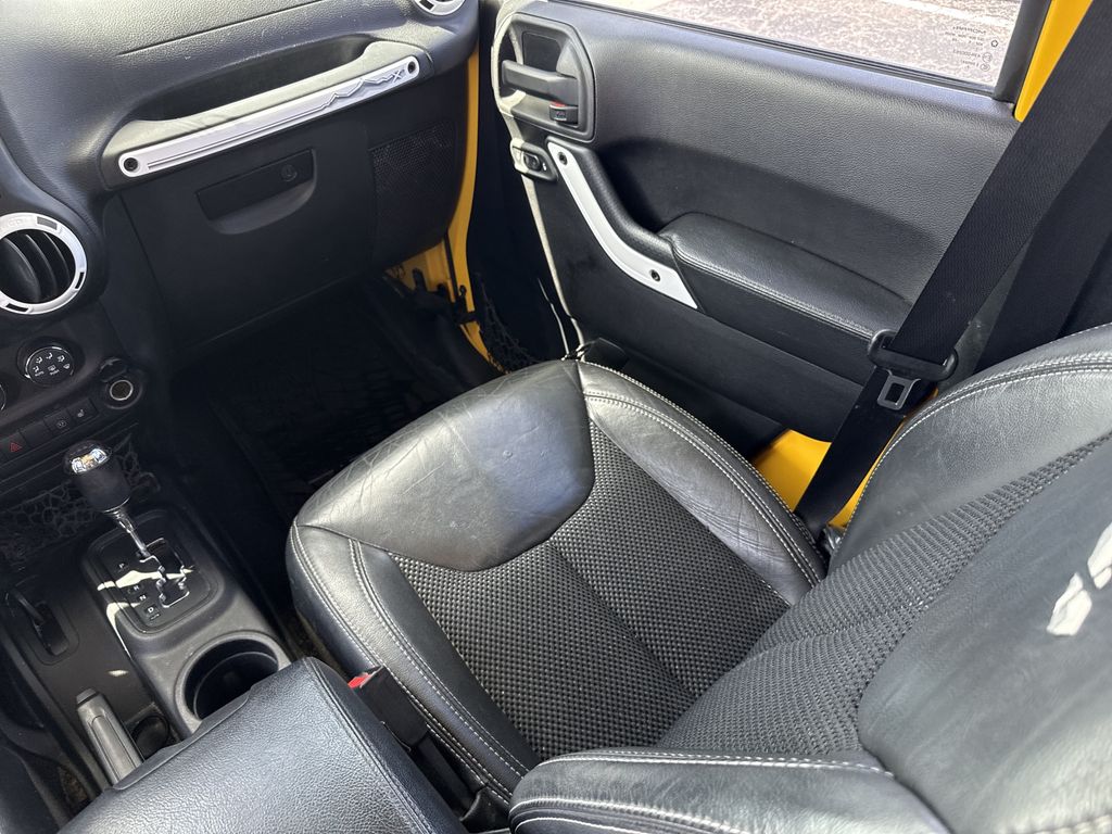 2015 Jeep Wrangler Unlimited Sahara Yellow at Parkway Family Mazda