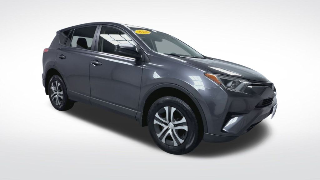 Used 2018 Toyota RAV4 LE with VIN JTMBFREV0JJ738781 for sale in Swanzey, NH