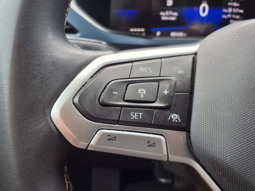 2023 Volkswagen Taos 1.5T SE White at DeMontrond Auto Country