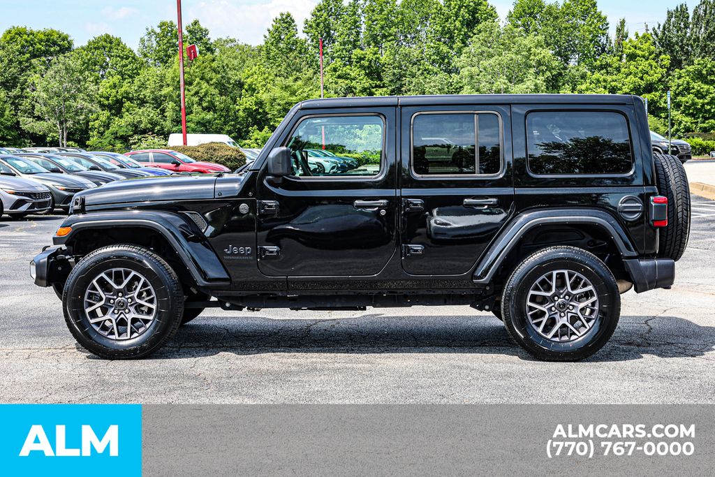 Used 2025 Black Jeep Sahara / MT Certified image 9
