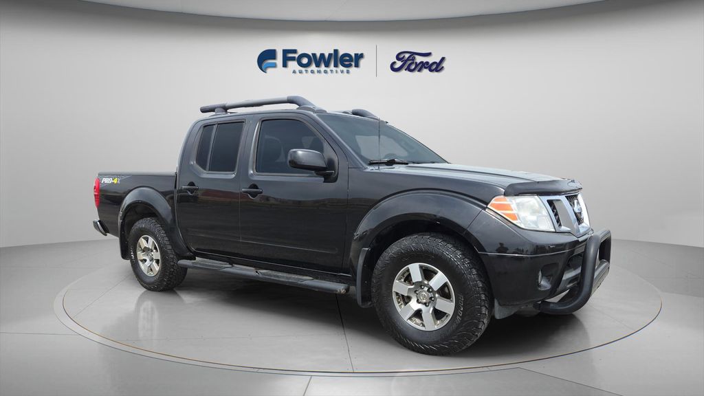 Super Black 2013 Nissan Frontier PRO-4X Crew Cab 4WD Pickup Truck Four-Wheel Drive 5-Speed Automatic Overdrive