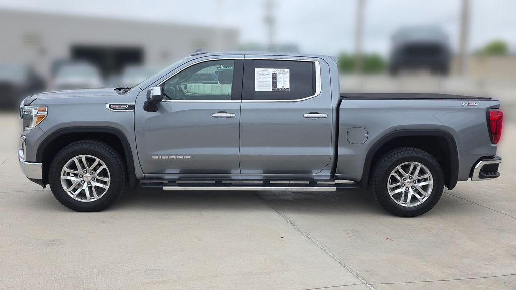 Used 2021 GMC Sierra 1500 SLT with VIN 1GTU9DEL5MZ222410 for sale in Kansas City