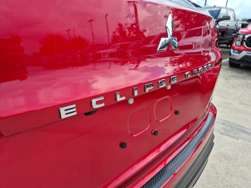 2025 Mitsubishi Eclipse Cross LE Red at DeMontrond Gulf Freeway