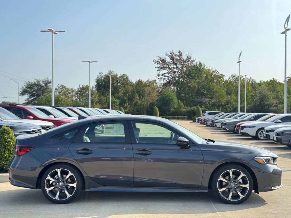 2026 Honda Civic Hybrid Sport Touring Gold at Community Honda