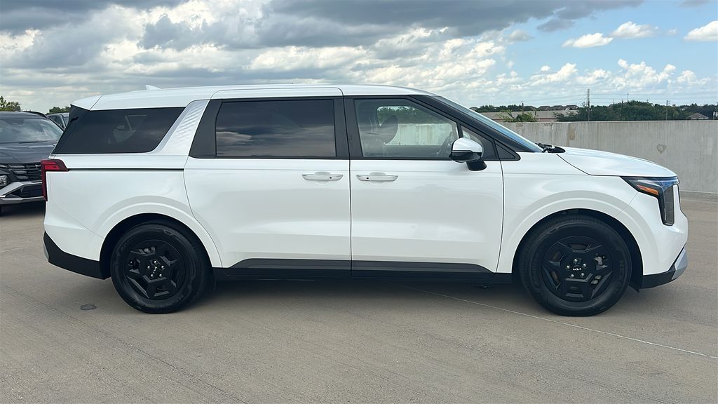 2026 Kia Carnival LXS White at DeMontrond Automotive Group