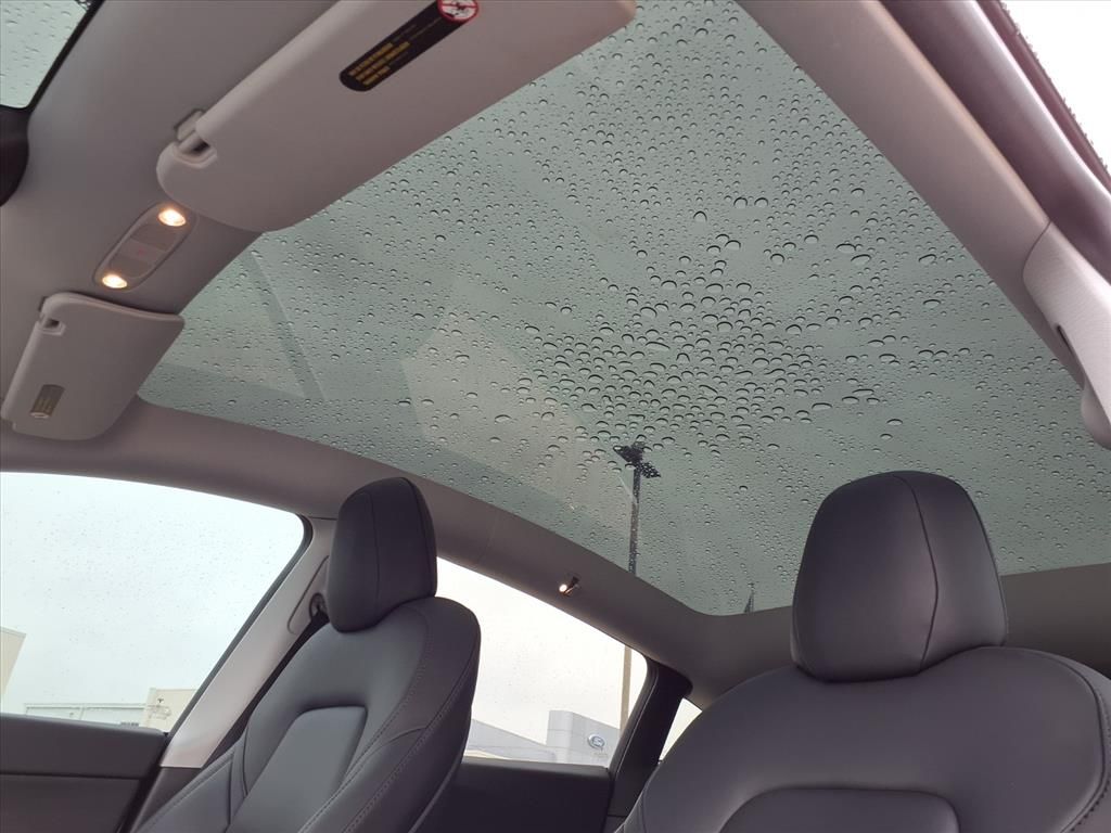 2021 Tesla Model Y Long Range White at Central Houston Nissan