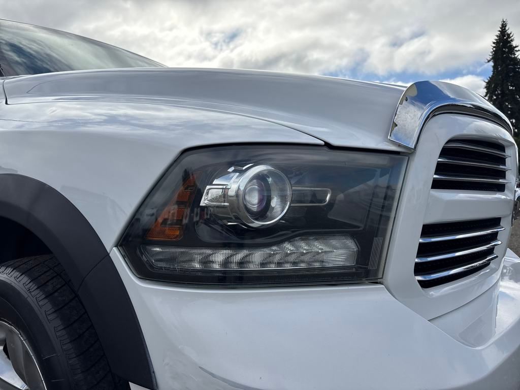 2013 Bright White Clearcoat Ram 1500 Sport 4X4 Truck